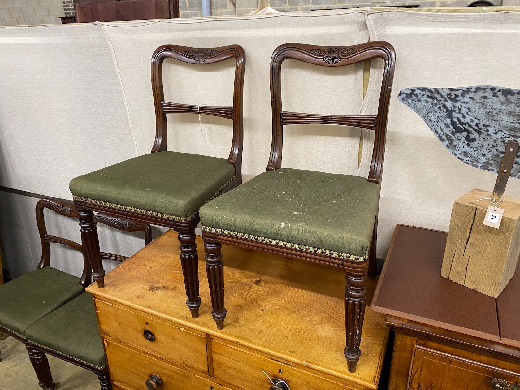 A set of eight early Victorian mahogany dining chairs on turned fluted legs